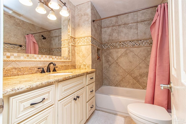 full bathroom featuring vanity, shower / bath combination with curtain, toilet, and backsplash