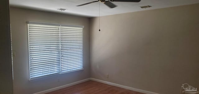 unfurnished room featuring ceiling fan and wood-type flooring