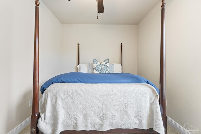 bedroom featuring baseboards, ceiling fan, and carpet