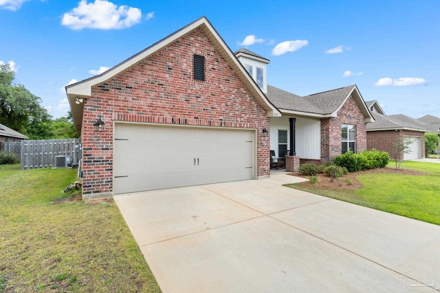 view of front of house with brick siding, central AC, driveway, and a front yard