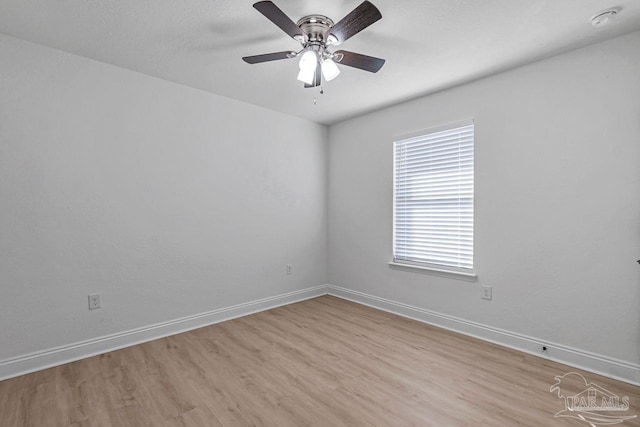 unfurnished room featuring ceiling fan and light wood-type flooring