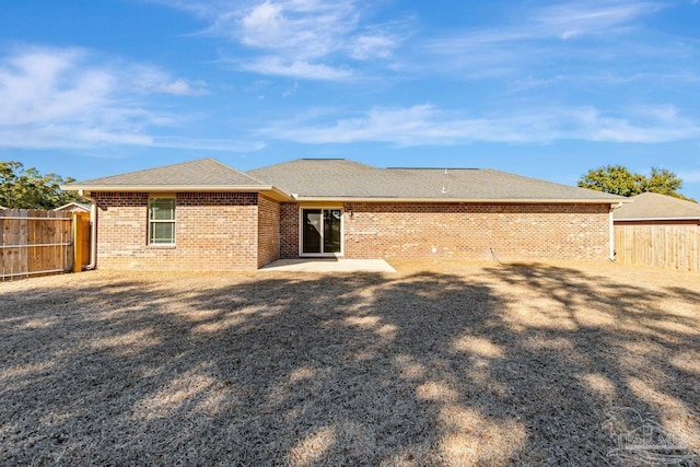 rear view of house featuring a patio