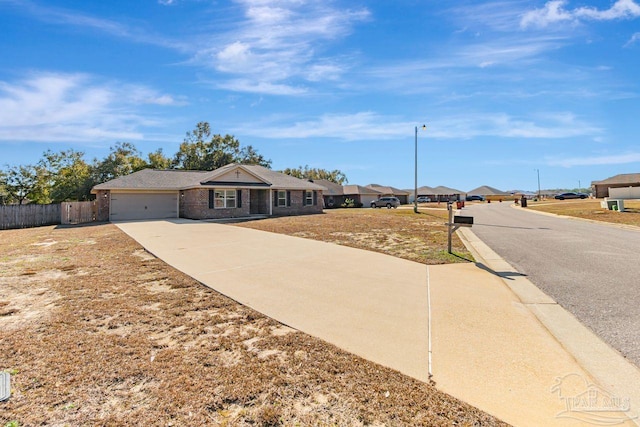 single story home with a garage