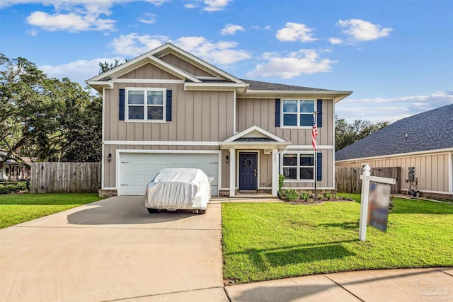 view of front facade with a garage and a front yard