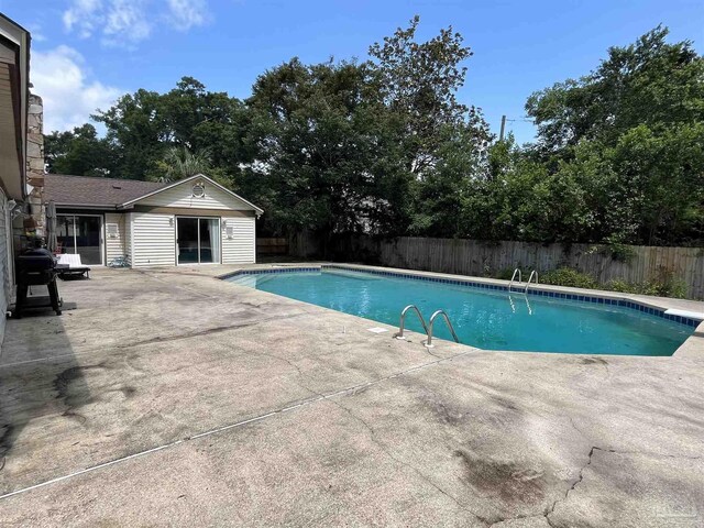 view of pool with a patio