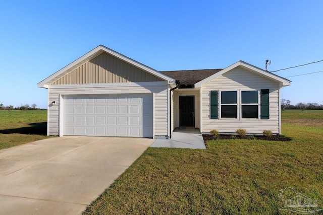 ranch-style house with a garage, concrete driveway, and a front yard