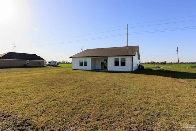 view of front of house with a front lawn