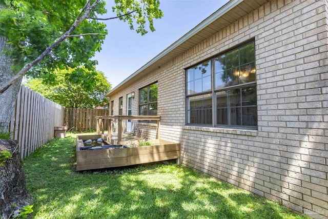 view of yard with a deck