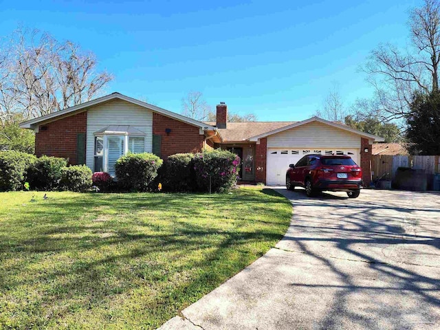 8176 Camelford Dr, Pensacola, FL 32506 - ranch-style home with an attached garage, brick siding, driveway, and a chimney