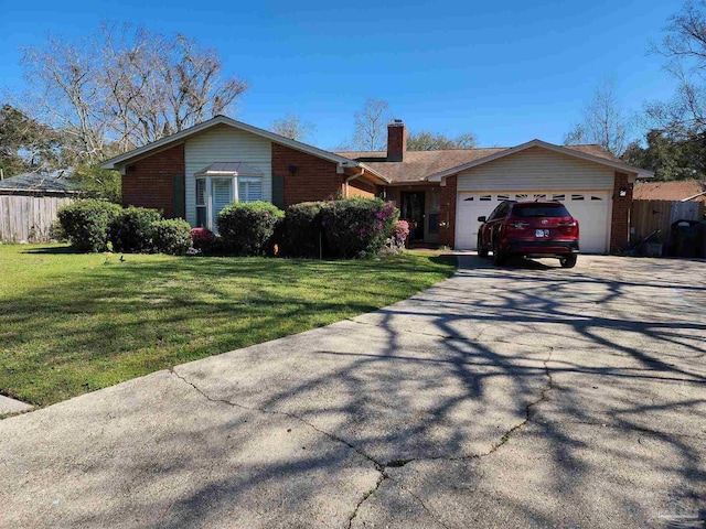 8176 Camelford Dr, Pensacola, FL 32506 - single story home with fence, a front yard, a chimney, a garage, and driveway