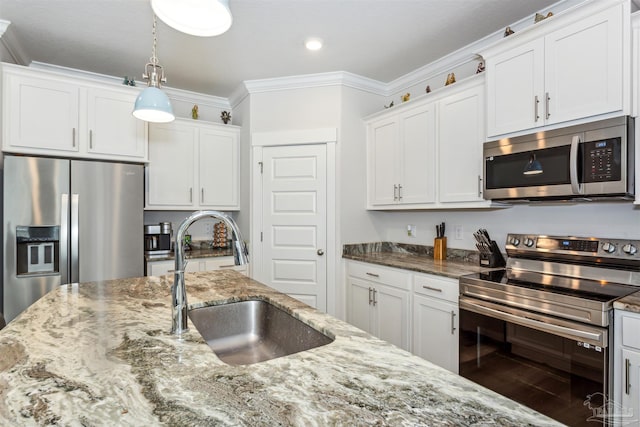 kitchen featuring stainless steel appliances, white cabinetry, crown molding, and sink