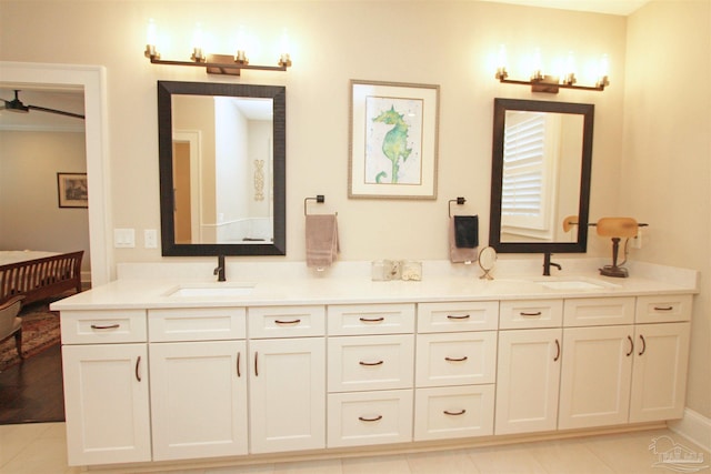 bathroom featuring tile patterned flooring, vanity, and ceiling fan