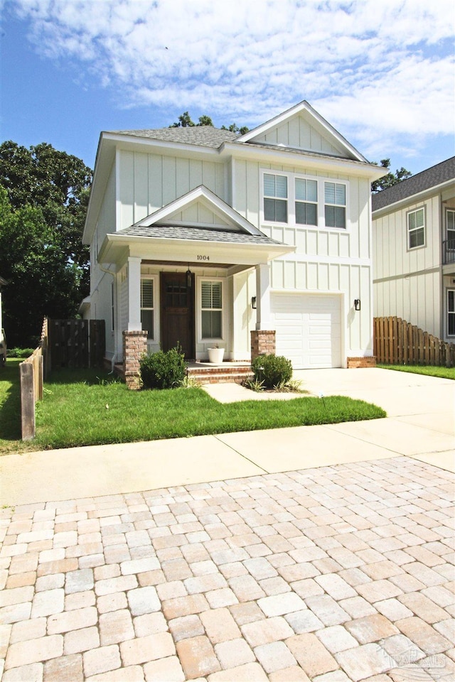 view of front of property with a garage