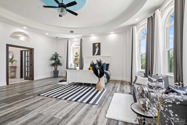 502 Deer Point Dr, Gulf Breeze, FL 32561 - bedroom with wood finished floors, recessed lighting, multiple windows, baseboards, and a ceiling fan