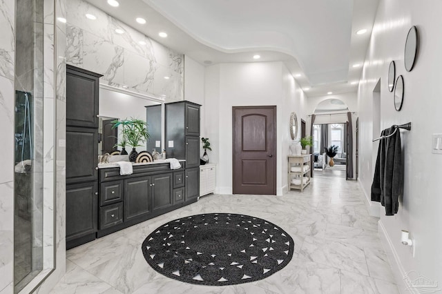 502 Deer Point Dr, Gulf Breeze, FL 32561 - full bath with baseboards, recessed lighting, marble tiled floors, vanity, and a shower
