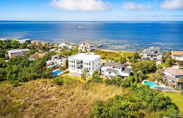 502 Deer Point Dr, Gulf Breeze, FL 32561 - aerial perspective of suburban area featuring a pool area and a nearby body of water