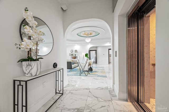 502 Deer Point Dr, Gulf Breeze, FL 32561 - hallway featuring marble finish flooring, ornamental molding, and arched walkways