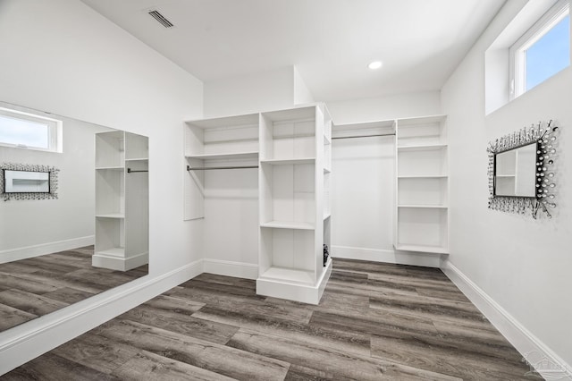 502 Deer Point Dr, Gulf Breeze, FL 32561 - spacious closet with dark wood-style flooring
