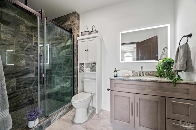 502 Deer Point Dr, Gulf Breeze, FL 32561 - bathroom featuring marble finish floors, a stall shower, toilet, and vanity