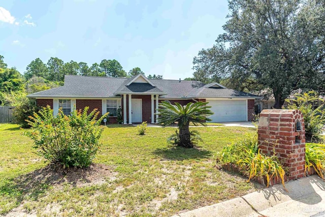 ranch-style house with a garage and a front yard