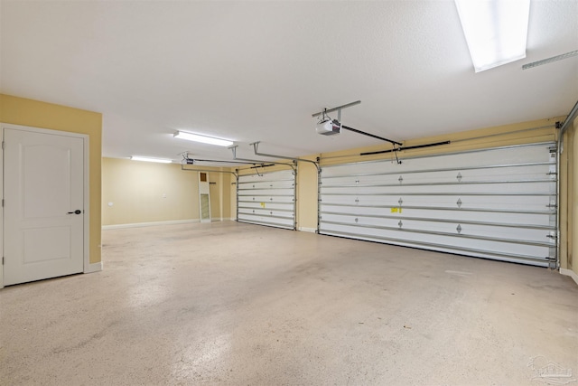 1011 Bucyrus Ln, Cantonment, FL 32533 - garage with a garage door opener and baseboards