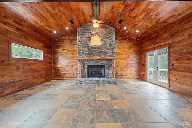 1011 Bucyrus Ln, Cantonment, FL 32533 - unfurnished living room featuring wooden walls, french doors, wooden ceiling, a ceiling fan, and lofted ceiling