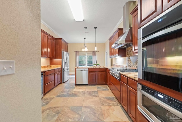 1011 Bucyrus Ln, Cantonment, FL 32533 - kitchen with stainless steel appliances, a textured wall, a peninsula, pendant lighting, and a sink