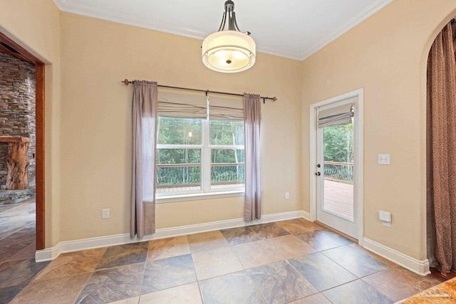 1011 Bucyrus Ln, Cantonment, FL 32533 - doorway featuring arched walkways, ornamental molding, and baseboards