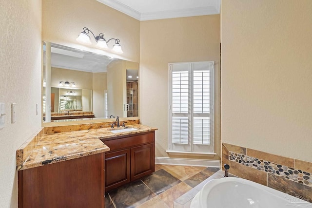 1011 Bucyrus Ln, Cantonment, FL 32533 - full bath with ornamental molding, vanity, a bath, baseboards, and stone finish flooring