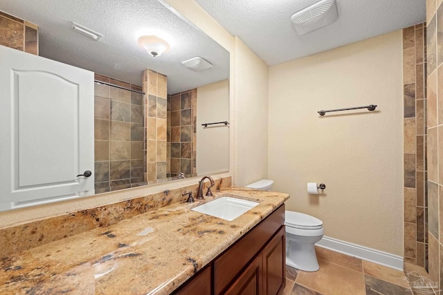 1011 Bucyrus Ln, Cantonment, FL 32533 - full bath with baseboards, vanity, toilet, walk in shower, and a textured ceiling