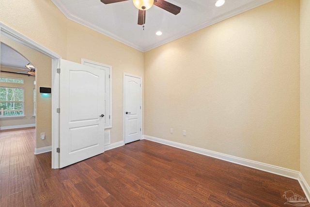 1011 Bucyrus Ln, Cantonment, FL 32533 - unfurnished room with ceiling fan, crown molding, wood finished floors, and baseboards