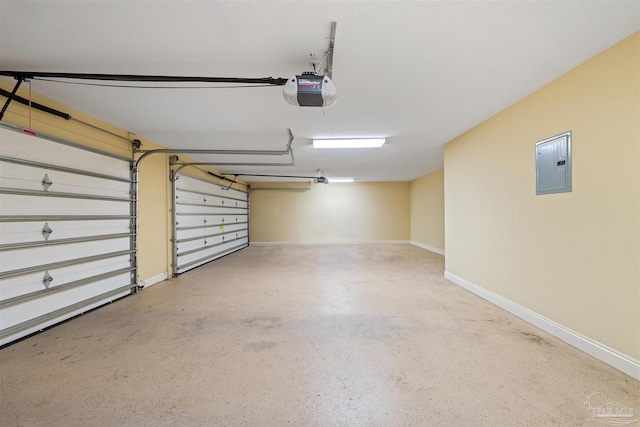 1011 Bucyrus Ln, Cantonment, FL 32533 - garage featuring electric panel, a garage door opener, and baseboards