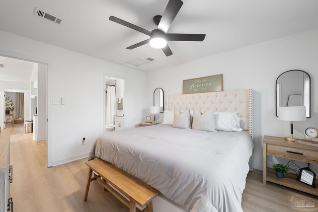 6216 Forest Pines Dr, Pensacola, FL 32526 - bedroom featuring light wood finished floors, baseboards, ensuite bath, and a ceiling fan