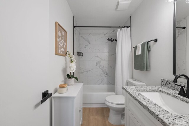 6216 Forest Pines Dr, Pensacola, FL 32526 - bathroom featuring toilet, vanity, shower / bathtub combination with curtain, and wood finished floors