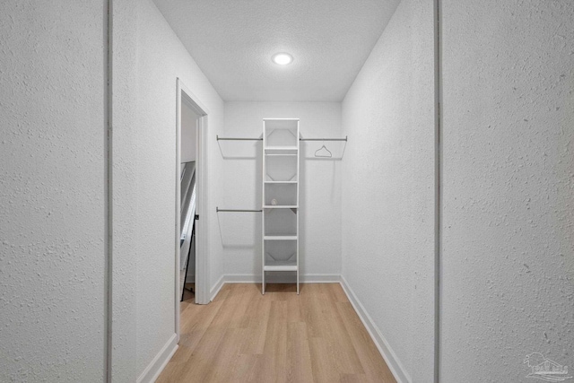 6216 Forest Pines Dr, Pensacola, FL 32526 - walk in closet featuring light wood finished floors