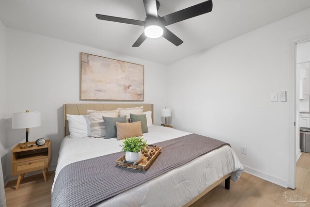 6216 Forest Pines Dr, Pensacola, FL 32526 - bedroom featuring wood finished floors, ceiling fan, and baseboards