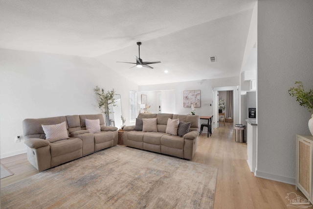 6216 Forest Pines Dr, Pensacola, FL 32526 - living area featuring light wood finished floors, ceiling fan, and lofted ceiling