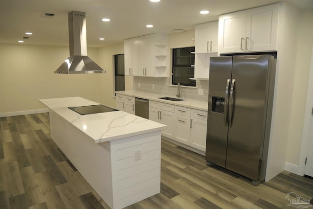 kitchen featuring a kitchen island, open shelves, island exhaust hood, a sink, and stainless steel appliances