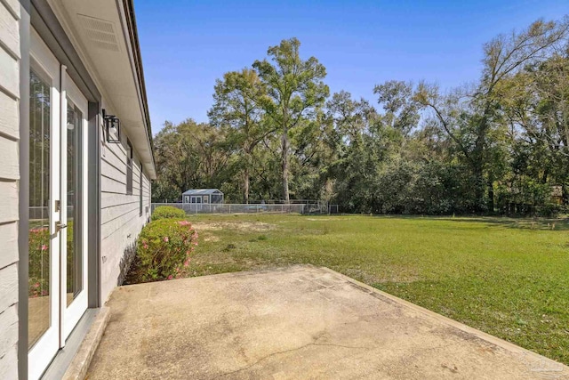 view of yard with a fenced backyard and a patio area