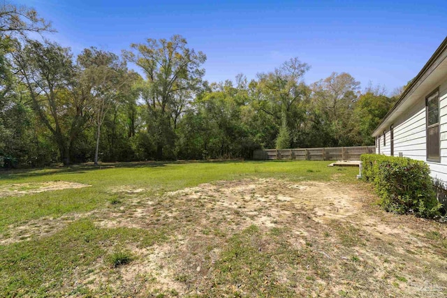 view of yard with fence