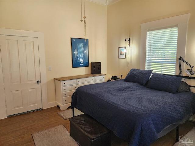 210 Mcrae St, Atmore, AL 36502 - bedroom featuring wood finished floors and baseboards