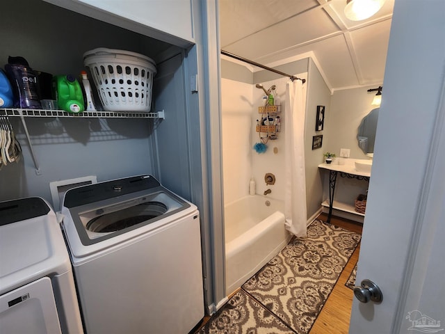 210 Mcrae St, Atmore, AL 36502 - bathroom with separate washer and dryer and shower / tub combo with curtain