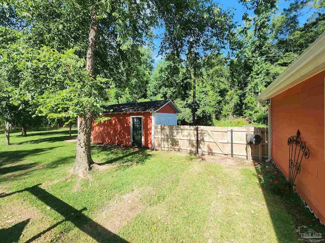 210 Mcrae St, Atmore, AL 36502 - view of yard with an outdoor structure