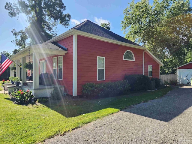 210 Mcrae St, Atmore, AL 36502 - view of home's exterior featuring a yard
