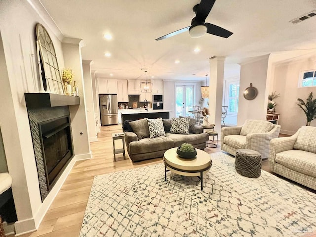 4979 Leeward Dr, Pensacola, FL 32507 - living area with baseboards, visible vents, recessed lighting, ceiling fan, and a fireplace