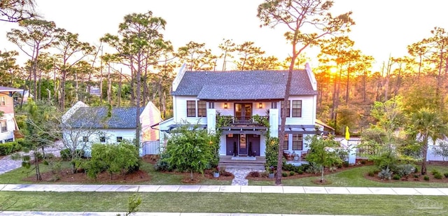4979 Leeward Dr, Pensacola, FL 32507 - view of front of home featuring a front lawn and a balcony