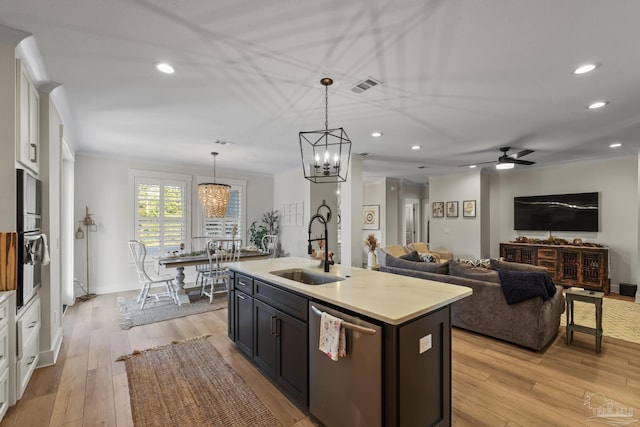 4979 Leeward Dr, Pensacola, FL 32507 - kitchen featuring stainless steel dishwasher, a sink, visible vents, recessed lighting, and light countertops