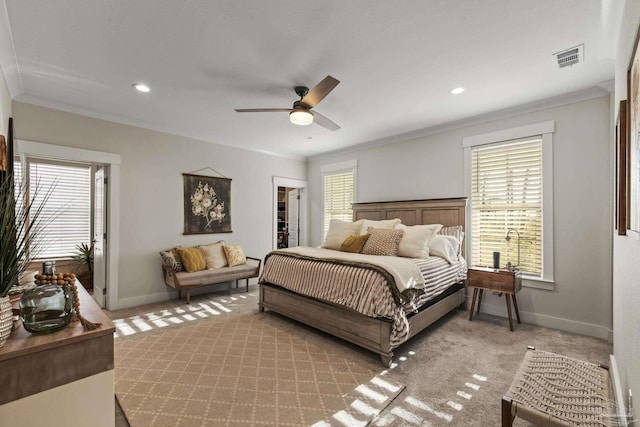 4979 Leeward Dr, Pensacola, FL 32507 - carpeted bedroom with ornamental molding, baseboards, and multiple windows