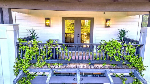 4979 Leeward Dr, Pensacola, FL 32507 - doorway to property with covered porch and french doors