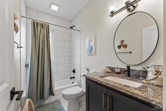 4979 Leeward Dr, Pensacola, FL 32507 - bathroom featuring shower / bath combo with shower curtain, toilet, and vanity